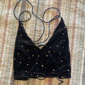 Romwe top in size S. Dark blue with gold stars and a corset-esque back :)